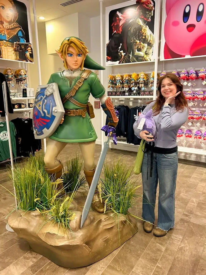 Posing next to the Link statue at the Nintendo Store